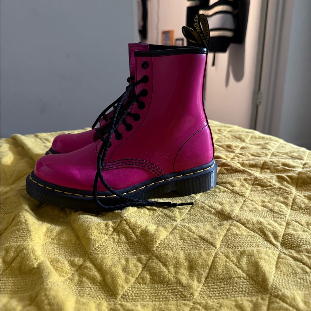 Pink patent leather 8 eye Dr. Martens. Lightwear